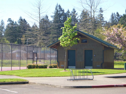 Accessible restrooms near 2 tennis courts – across from Rhododendron Garden
